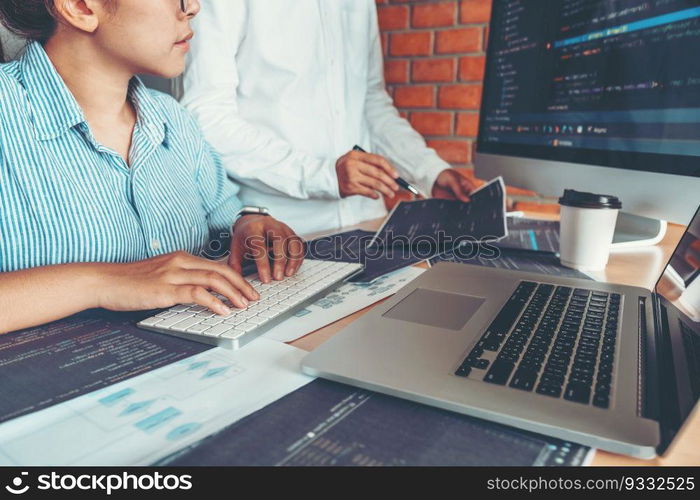Developing Concentrated programmer reading computer codes Development Website design and coding technologies.