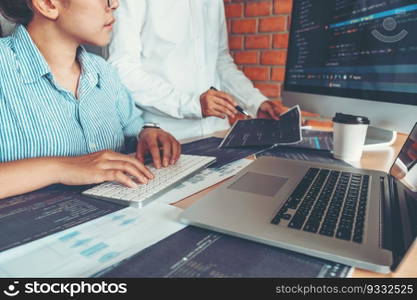 Developing Concentrated programmer reading computer codes Development Website design and coding technologies.