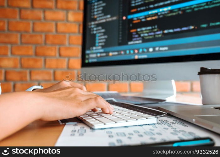 Developing Concentrated programmer reading computer codes Development Website design and coding technologies.