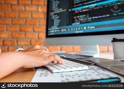Developing Concentrated programmer reading computer codes Development Website design and coding technologies.