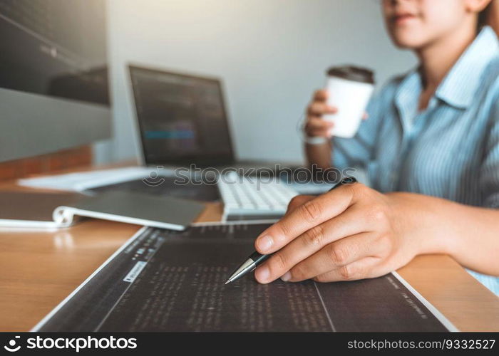 Developing Concentrated programmer reading computer codes Development Website design and coding technologies.
