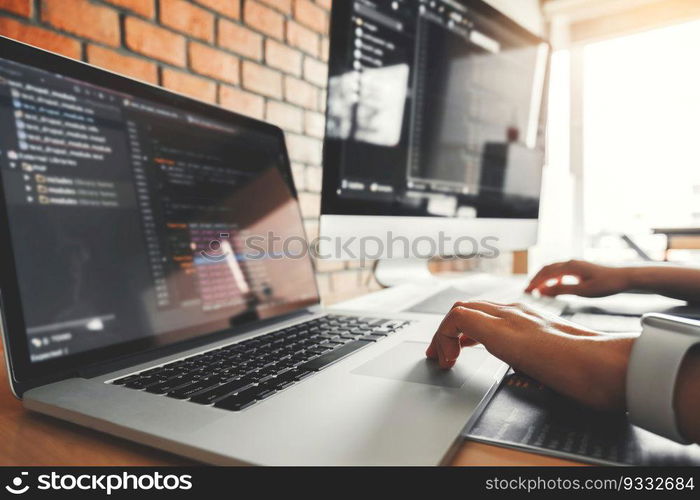 Developing Concentrated programmer reading computer codes Development Website design and coding technologies.