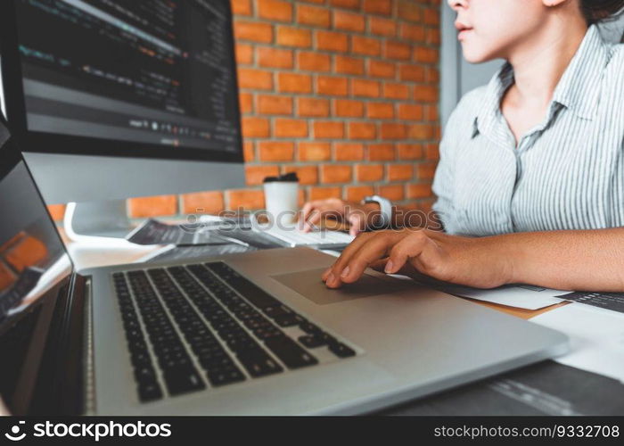 Developing Concentrated programmer reading computer codes Development Website design and coding technologies.