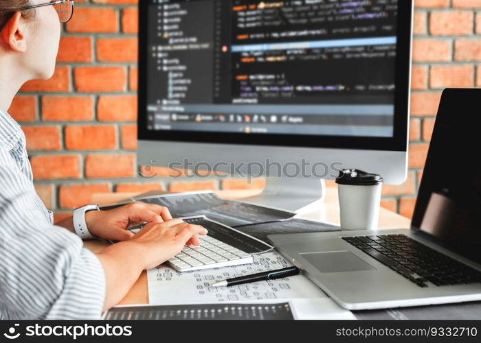 Developing Concentrated programmer reading computer codes Development Website design and coding technologies.