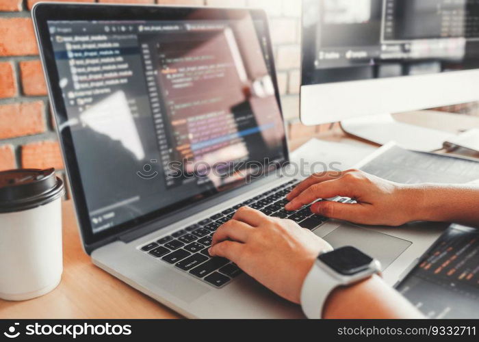Developing Concentrated programmer reading computer codes Development Website design and coding technologies.