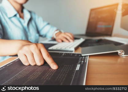 Developing Concentrated programmer reading computer codes Development Website design and coding technologies.