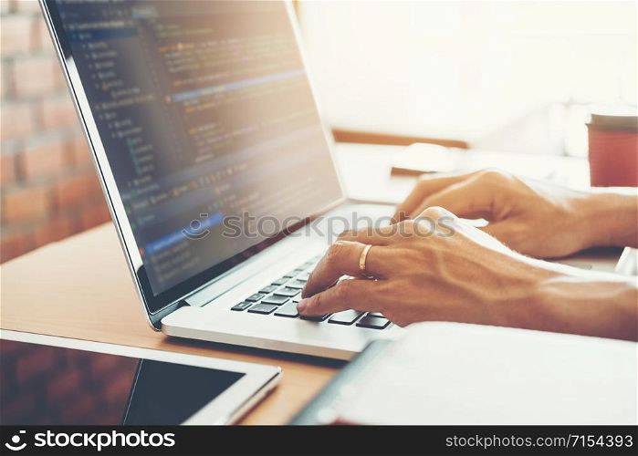 Developing programmer Development Website design and coding technologies working in software company office