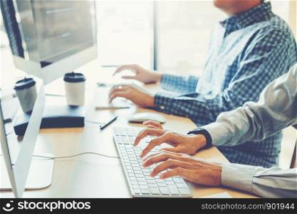 Developing programmer Team Development Website design and coding technologies working in software company office