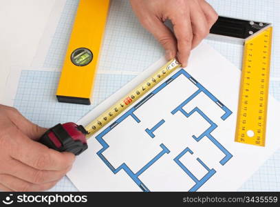 development drawings and tools on graph paper