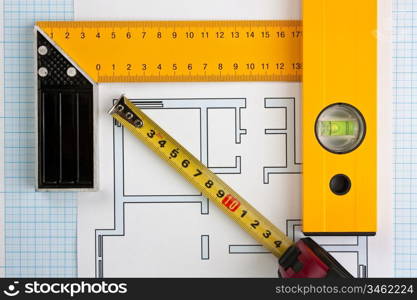 development drawings and tools on graph paper