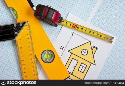 development drawings and tools on graph paper