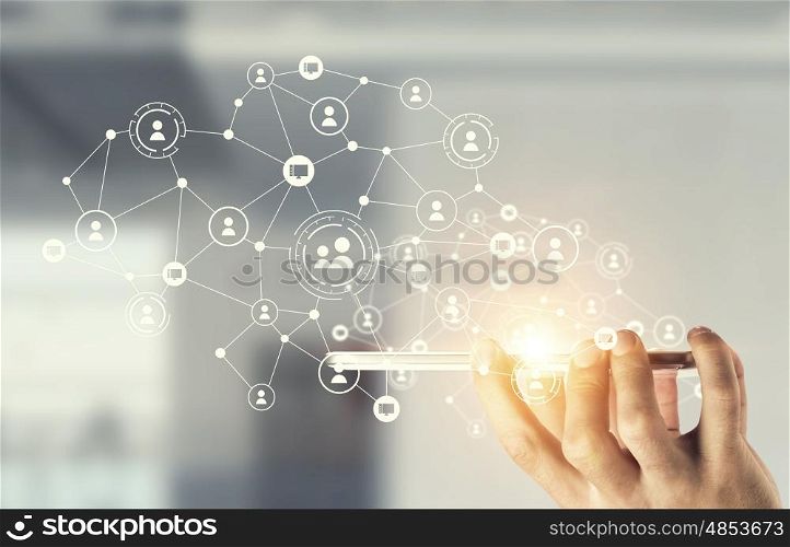 Devices connecting people. Hand holding smartphone and connection lines as social network concept