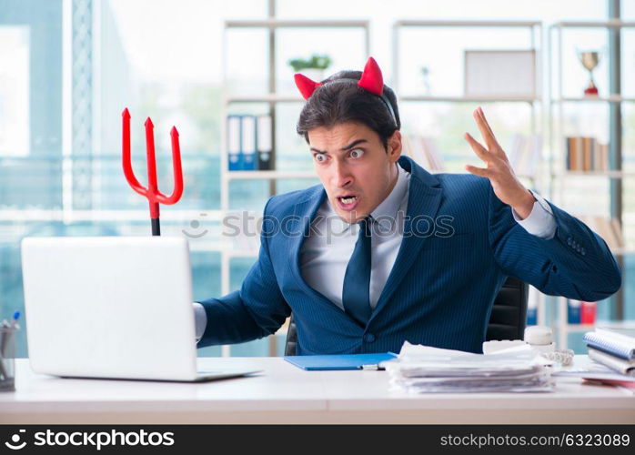 Devil angry businessman in the office