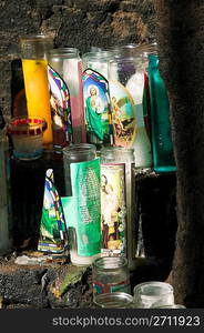 Devotional candles on an outdoor altar