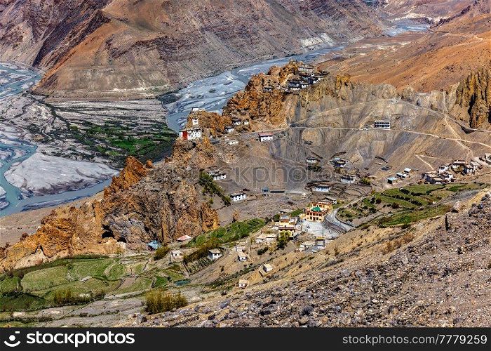 Dhankar monastry perched on a cliff in Himalayas and village. Dhankar, Spiti Valley, Himachal Pradesh, India. Dhankar monastry perched on a cliff in Himalayas, India