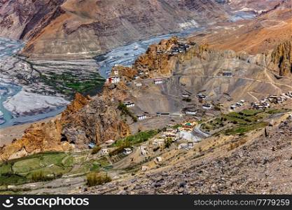 Dhankar monastry perched on a cliff in Himalayas and village. Dhankar, Spiti Valley, Himachal Pradesh, India. Dhankar monastry perched on a cliff in Himalayas, India