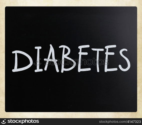 ""Diabetes" handwritten with white chalk on a blackboard"