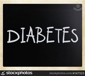 ""Diabetes" handwritten with white chalk on a blackboard"
