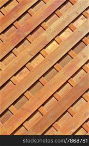 Diagonal planked wooden fence background for your design.