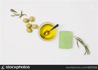 diagonal row olives with olive oil products. High resolution photo. diagonal row olives with olive oil products. High quality photo