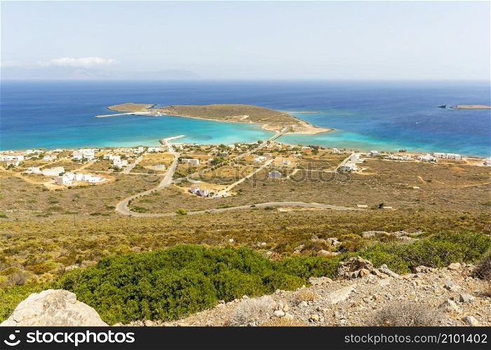 Diakofti port at the Greek island of Kythira. The shipwreck of the Russian boat Norland is in a distance.. Diakofti port at the Greek island of Kythira. The shipwreck of the Russian boat Norland in a distance.
