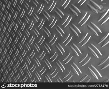 Diamond steel. Diamond steel metal sheet useful as background - selective focus