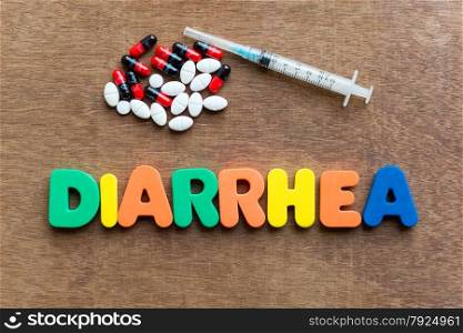 diarrhea colorful word in the wooden background