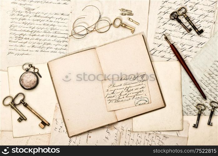 Diary book, vintage accessories, old letters and postcards. Nostalgic background