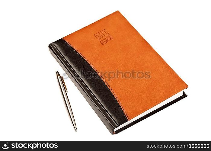 Diary for 2011 year with leather cover and metal pen on table isolated on white background