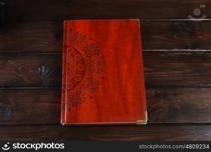 diary on a wooden table