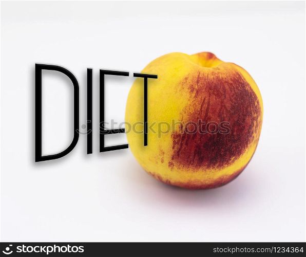 Diet concept. A Peach with fine and mature skin, with reddish and yellow-orange tones.
