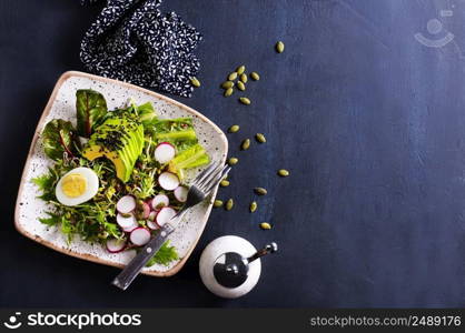 Diet food, helthy breakfast, salad with avocado and eggs. fresh salad, salad with avocado and boiled eggs