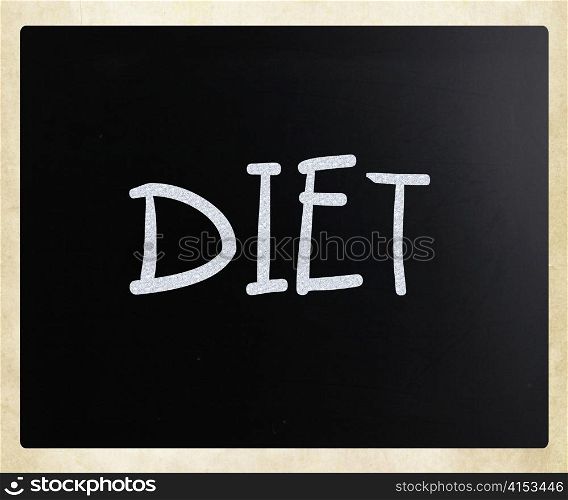 ""Diet" handwritten with white chalk on a blackboard"