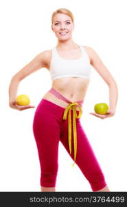 Diet. Health care and healthy nutrition. Fit girl fitness woman with measure tapes holding citrus fruits isolated on white.