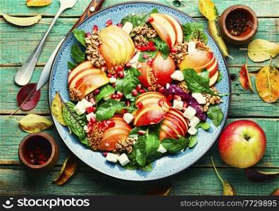 Diet salad of apples,cheese,herbs and oatmeal.Healthy salad. Homemade salad with apple,arugula and oatmeal