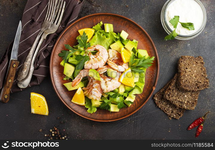 diet salad with avocado and boiled shrimps