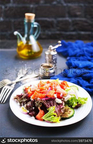 diet salad with salmon and fresh vegetables