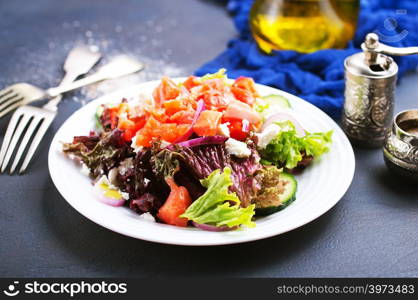 diet salad with salmon and fresh vegetables