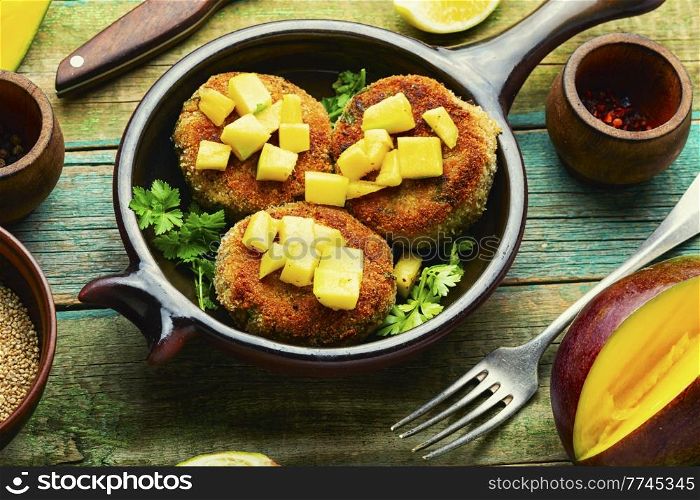 Diet vegan quinoa and mango cutlets, vegetarian meal. Vegan quinoa and mango burgers