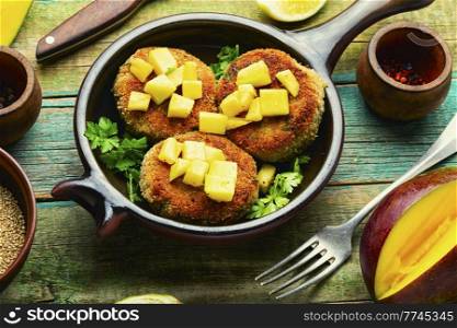 Diet vegan quinoa and mango cutlets, vegetarian meal. Vegan quinoa and mango burgers