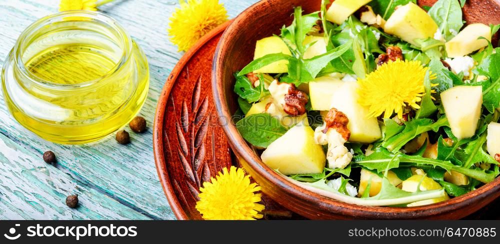 Diet vegetarian salad. Vegan salad of with apples, nuts and dandelions.Vegan salad.Diet menu.Lettuce