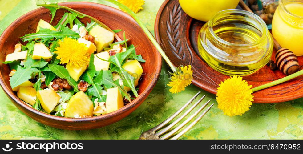 Diet vegetarian salad. Vegan salad of with apples, nuts and dandelions.Vegan salad.Diet menu.Lettuce
