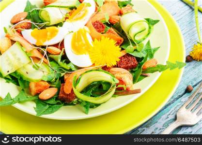 Diet vegetarian salad.Vegan salad. Vegan salad of with apples, nuts and dandelions.Vegan salad.Diet menu.Lettuce