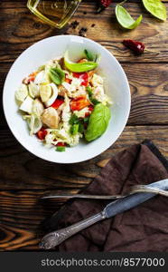 dietary salad with chicken,basil, cucumber, Chinese cabbage. Top view