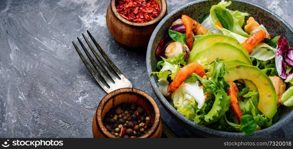 Dieting fresh seafood salad.Green salad with shrimps,mussel and avocado. Seafood salad with prawns