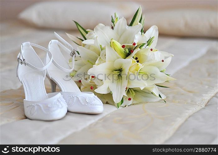different bride accessories on the bed