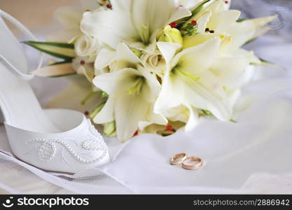 different bride accessories on the bed