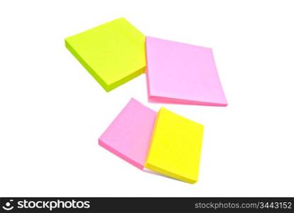 different color sticky notes on white background