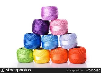 Different color threads isolated on white