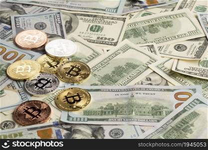 different colored bitcoin top dollar bills. High resolution photo. different colored bitcoin top dollar bills. High quality photo